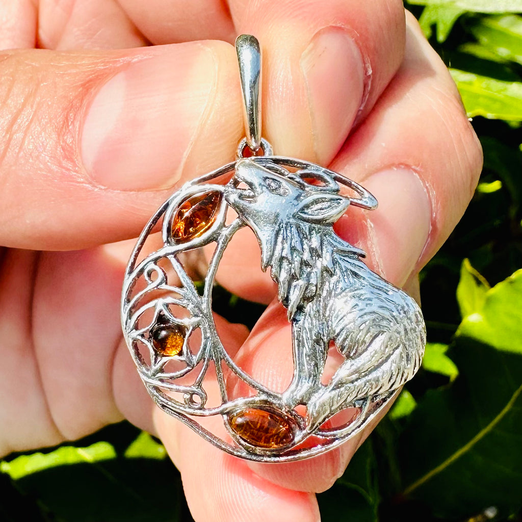 Amber Howling Wolf Pendant
