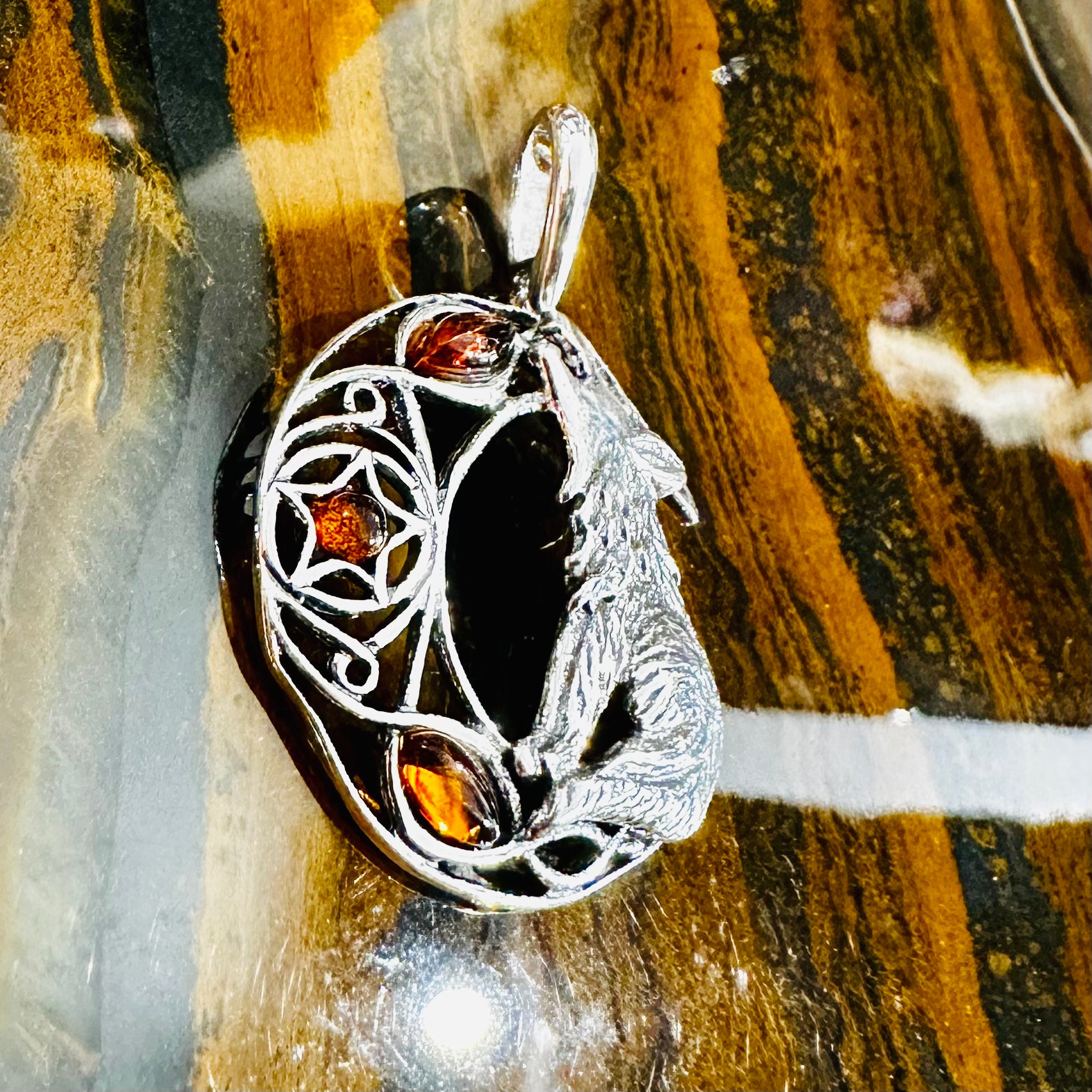 Amber Howling Wolf Pendant